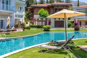 Bazén v ubytování Portvillas by Villa Safiya nebo v jeho okolí