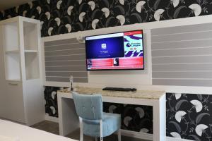 TV a/nebo společenská místnost v ubytování Hotel Admiral