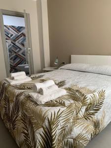 Rúm í herbergi á Albergo Piazza Risorgimento