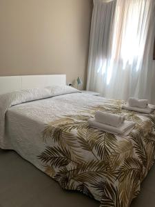 Rúm í herbergi á Albergo Piazza Risorgimento