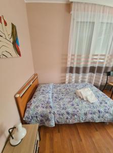 Postel nebo postele na pokoji v ubytování B&B Regina