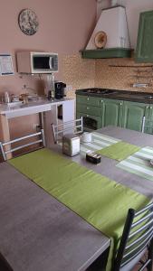 Kuchyň nebo kuchyňský kout v ubytování B&B Regina