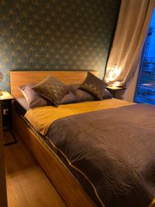 Postel nebo postele na pokoji v ubytování VIP Apartament-Marine