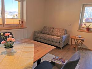 A seating area at Pension Tannheim