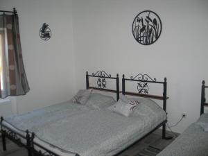 Tempat tidur dalam kamar di Réti Tanya Vendégház