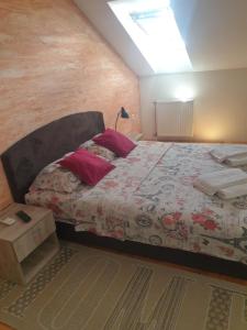 Tempat tidur dalam kamar di Apartment Loft