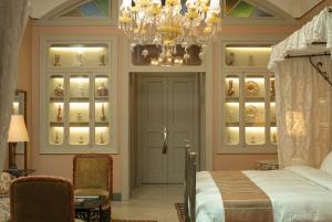 Ένα ή περισσότερα κρεβάτια σε δωμάτιο στο Albergo Hotel