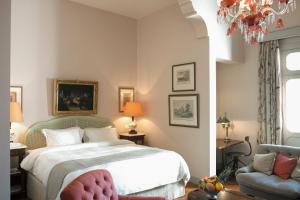 Ένα ή περισσότερα κρεβάτια σε δωμάτιο στο Albergo Hotel
