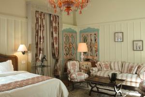 Ένα ή περισσότερα κρεβάτια σε δωμάτιο στο Albergo Hotel