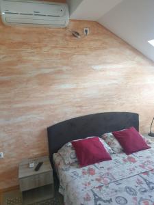 Tempat tidur dalam kamar di Apartment Loft