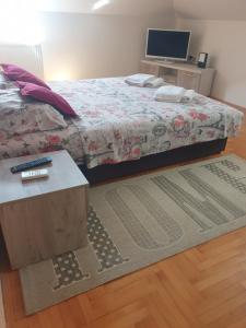 Tempat tidur dalam kamar di Apartment Loft