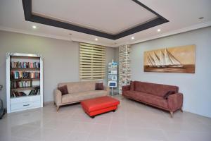 Χώρος καθιστικού στο Rose Garden Apart Hotel