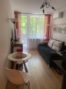 Posedenie v ubytovaní SEN na CICHEJ - Apartamenty w PARKU