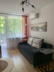 Posedenie v ubytovaní SEN na CICHEJ - Apartamenty w PARKU