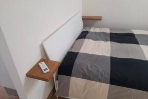 Tempat tidur dalam kamar di Appartamento nel cuore di Selargius