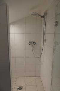 Koupelna v ubytování Ferienwohnungen Haus Kunterbunt + 28 fotografií