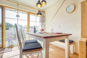 Gambar di galeri bagi Ferienpark Freesenbruch Wohnung 2 6 - Windrose di Zingst