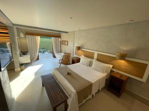 Cama ou camas em um quarto em Hiu Hotel