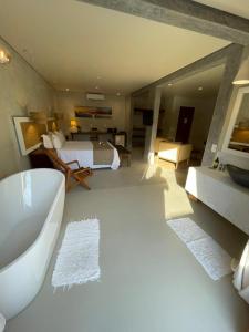 Cama ou camas em um quarto em Hiu Hotel