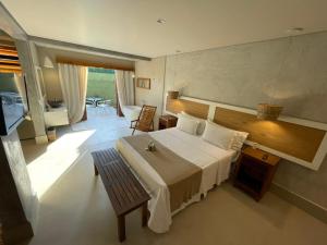 Cama ou camas em um quarto em Hiu Hotel