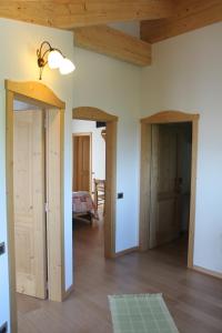 Posteľ alebo postele v izbe v ubytovaní Agritur Maso Rauter
