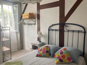 Postel nebo postele na pokoji v ubytování Entre Mer et Pins