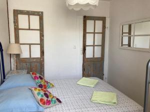 Postel nebo postele na pokoji v ubytování Entre Mer et Pins