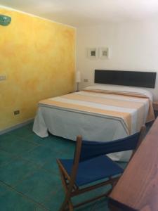 Un ou plusieurs lits dans un hébergement de l'établissement Biancolilla Acciaroli