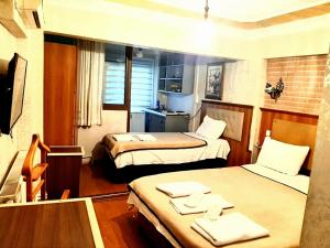 TV a/nebo společenská místnost v ubytování Istanbul Sydney Hotel