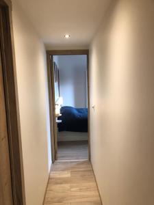 Postel nebo postele na pokoji v ubytování Chalet des Campanules avec Sauna