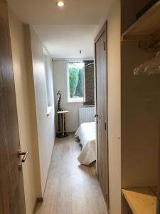 Postel nebo postele na pokoji v ubytování Chalet des Campanules avec Sauna