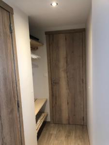 Postel nebo postele na pokoji v ubytování Chalet des Campanules avec Sauna