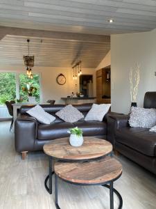 Posezení v ubytování Chalet des Campanules avec Sauna