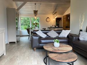 Posezení v ubytování Chalet des Campanules avec Sauna