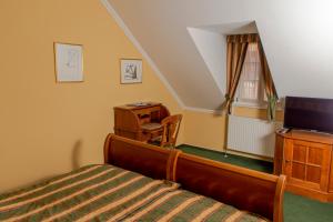 Postelja oz. postelje v sobi nastanitve Hotel Wollner