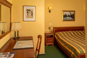 Postelja oz. postelje v sobi nastanitve Hotel Wollner