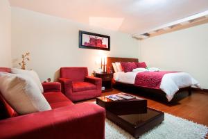 Ένα ή περισσότερα κρεβάτια σε δωμάτιο στο Loft Hotel