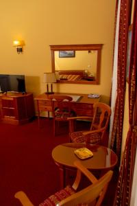 TV in/ali zabaviščno središče v nastanitvi Hotel Wollner