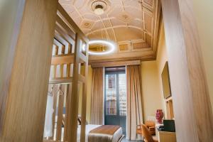 ETNEA Suite 270客房内的一张或多张床位
