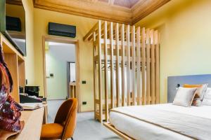 ETNEA Suite 270客房内的一张或多张床位