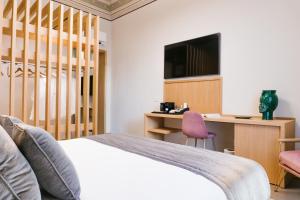 Televiisor ja/või meelelahutuskeskus majutusasutuses ETNEA Suite 270 +37 fotot