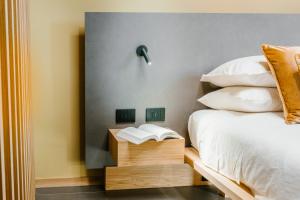 ETNEA Suite 270客房内的一张或多张床位