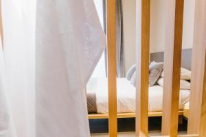 ETNEA Suite 270客房内的一张或多张床位