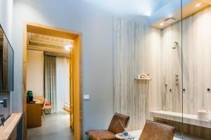 ETNEA Suite 270的电视和/或娱乐中心
