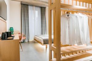 ETNEA Suite 270客房内的一张或多张床位