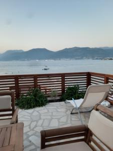 a balcony with a view of the water at Apartman Hana in Tivat