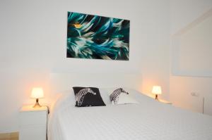 Łóżko lub łóżka w pokoju w obiekcie Villa Bendex Estepona Costa Del Sol
