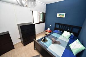 A bed or beds in a room at Casa Flores
