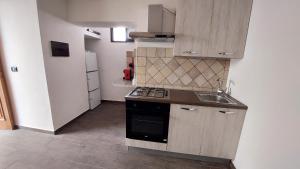 Kuchyň nebo kuchyňský kout v ubytování B&B Biancamano + 18 fotografií