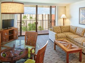 a living room with a couch and a table at Ocean View Getaway at Aston Ka'anapali Shores in Lahaina